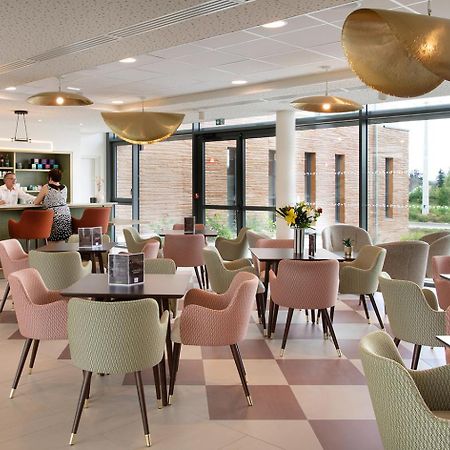 Le Criterium Aparthotel Ecouflant Exterior foto