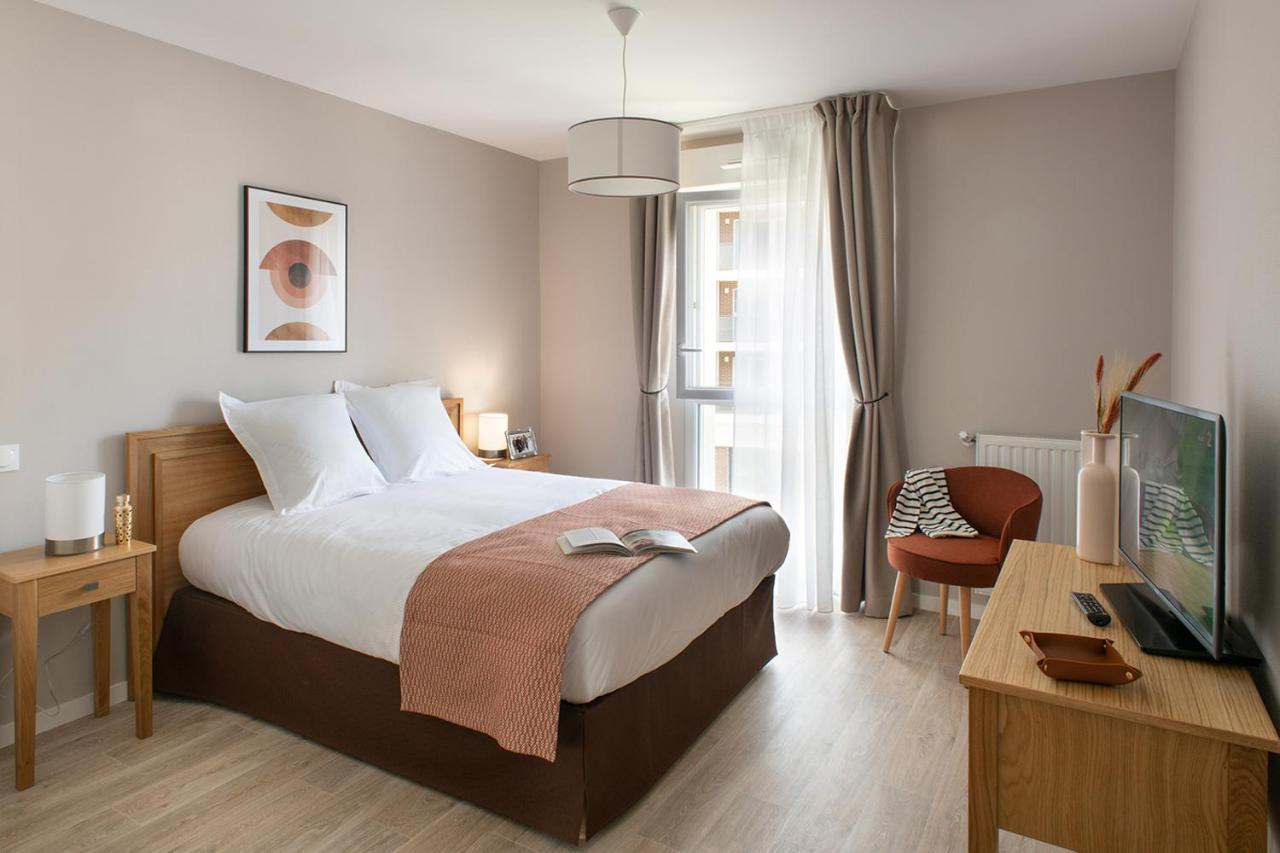 Le Criterium Aparthotel Ecouflant Exterior foto